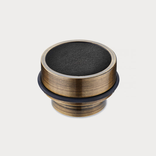Brass & Black Leather Mounted Door Stops in Antique