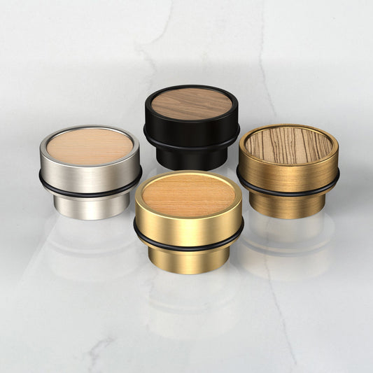 wooden and brass door stops