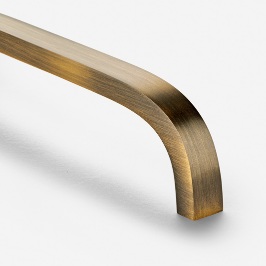 Brass Curved Cabinet Handles in Antique
