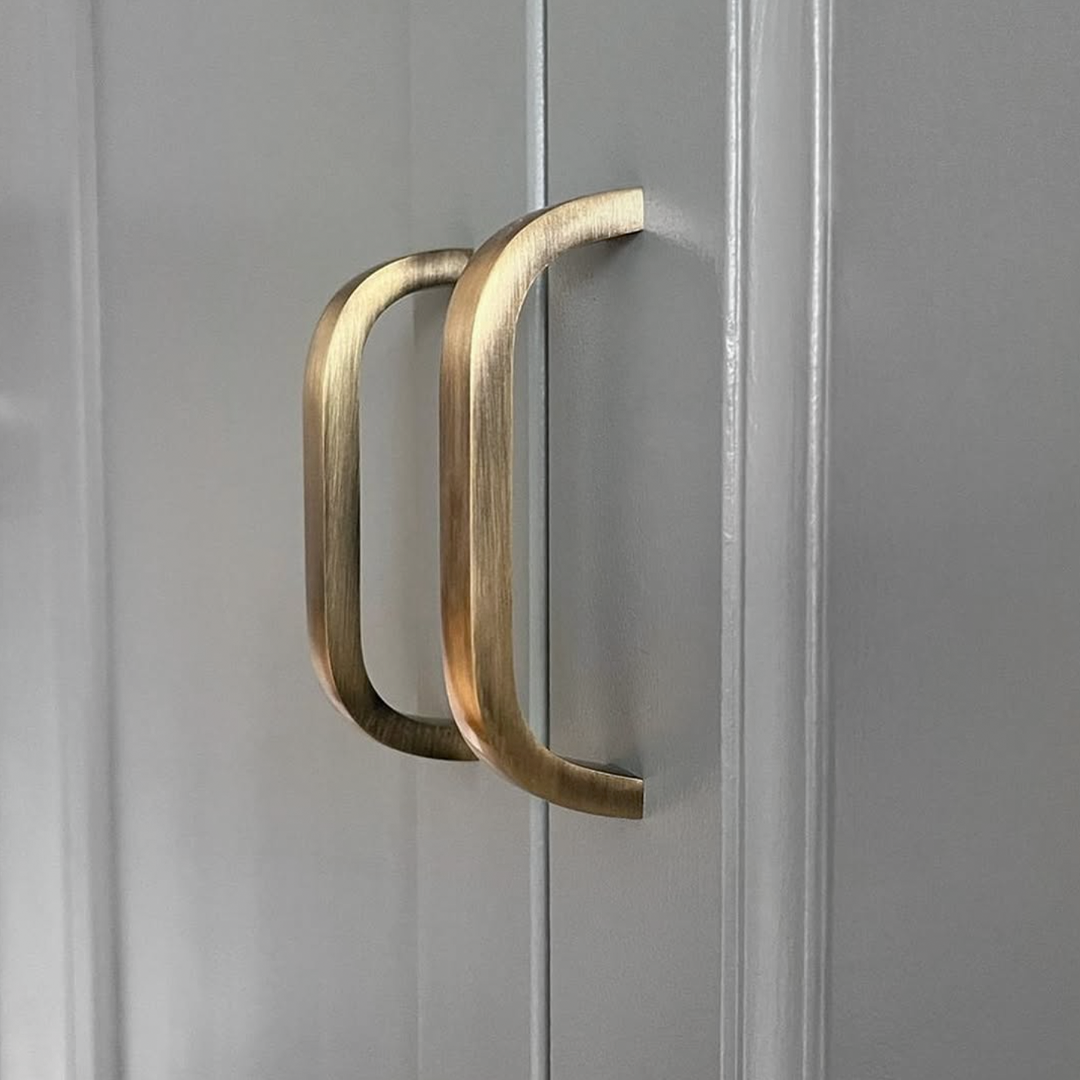 Brass Curved Cabinet Handles in Antique