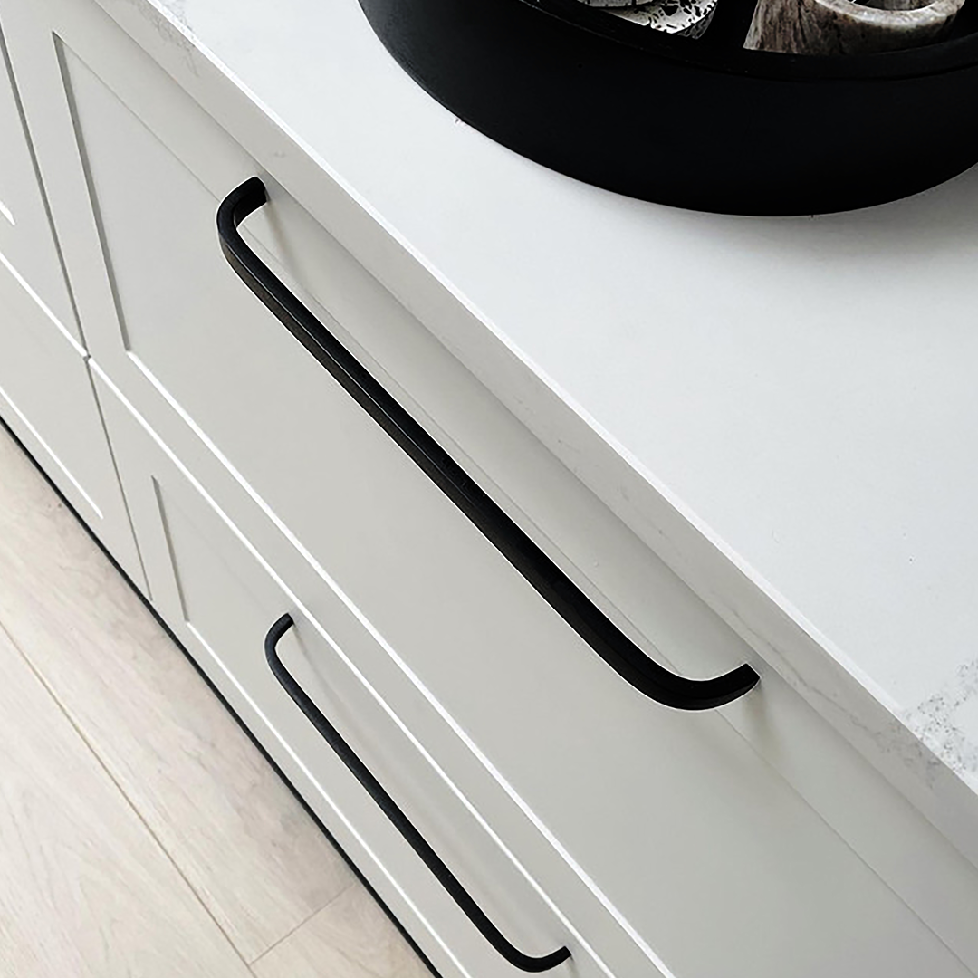 Brass Curved Cabinet Handles in Black