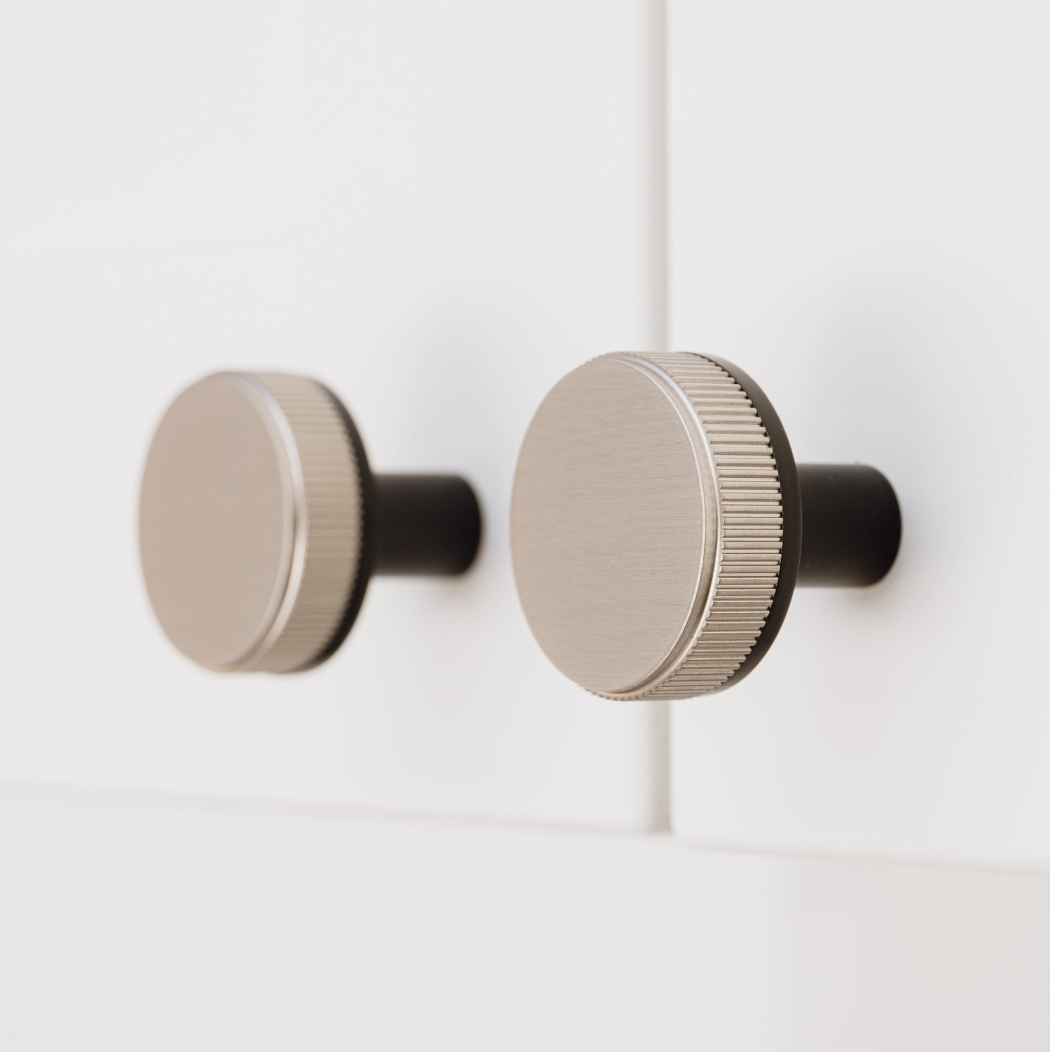 Black Brass Linear Door Knobs with Tip In Silver