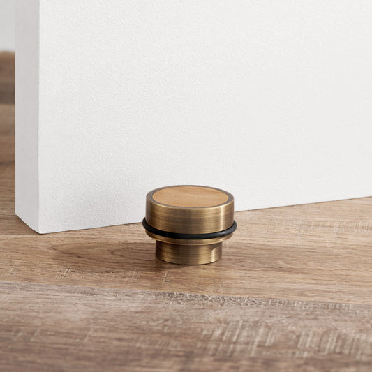 Brass & Maple Wood Floor Mounted Door Stops in Antique