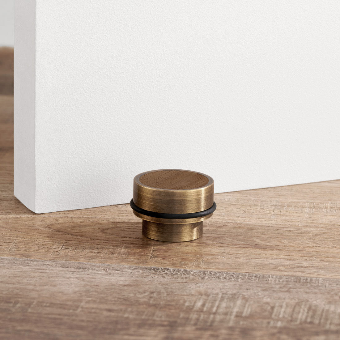 Brass & Walnut Wood Floor Mounted Door Stops in Antique