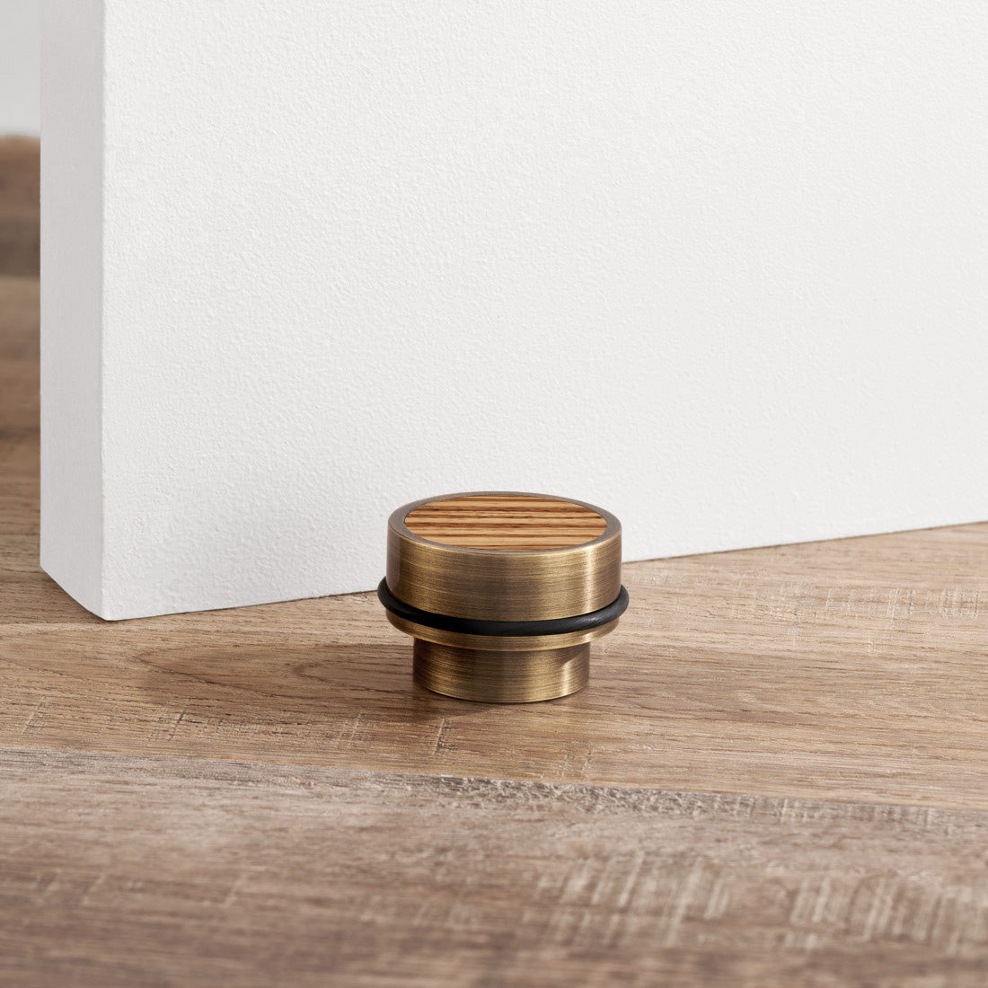 Brass & Zebrano Wood Floor Mounted Door Stops in Antique