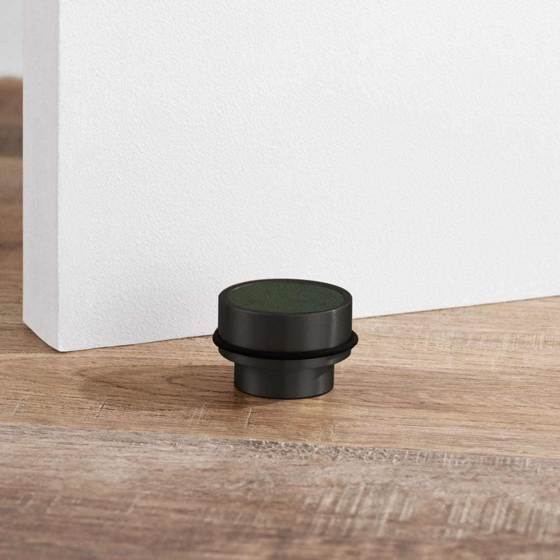 Brass & Green Leather Mounted Door Stops in Black