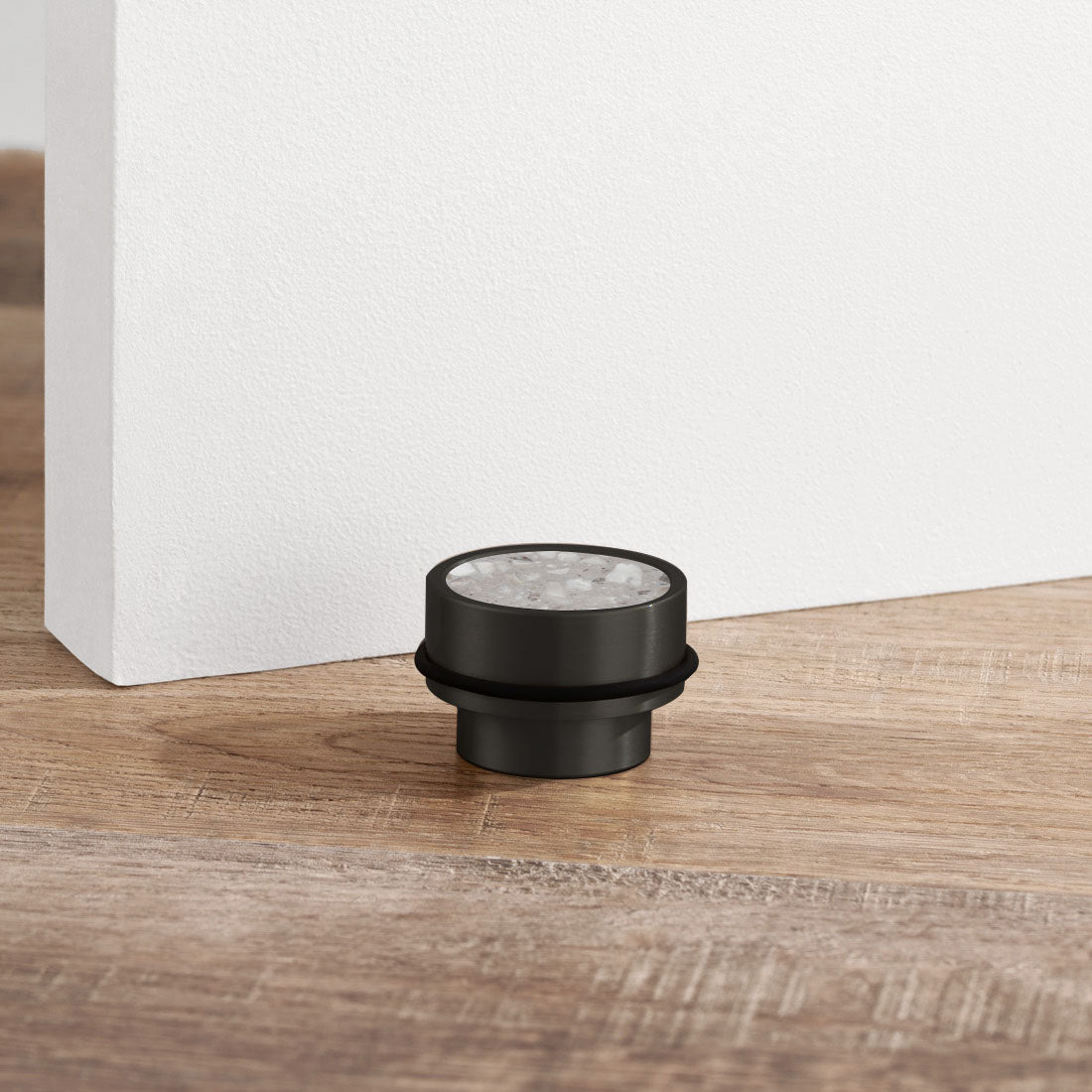 Brass & Grey Terrazzo Floor Mounted Door Stops in Black