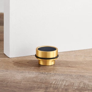 Brass & Blue Leather Mounted Door Stops in Gold