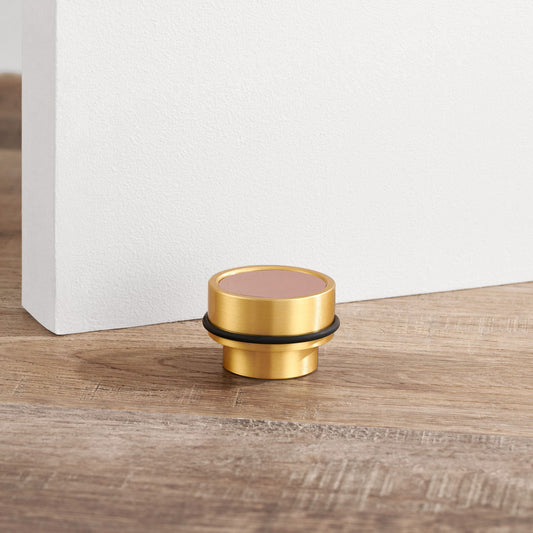 Brass & Pink Leather Mounted Door Stops in Gold