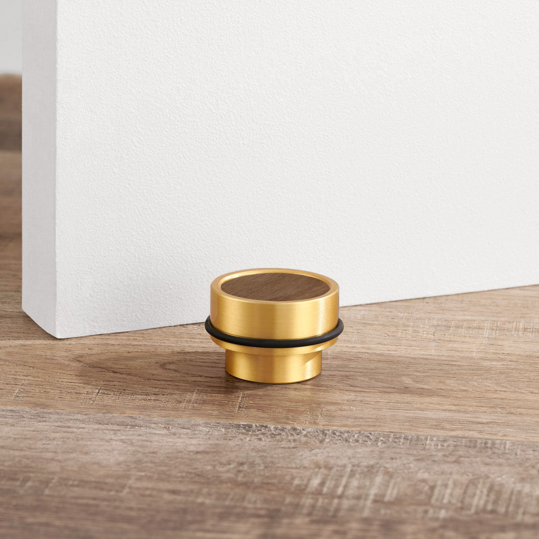 Brass & Walnut Wood Floor Mounted Door Stops in Gold