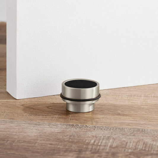 Brass & Black Leather Mounted Door Stops in Silver