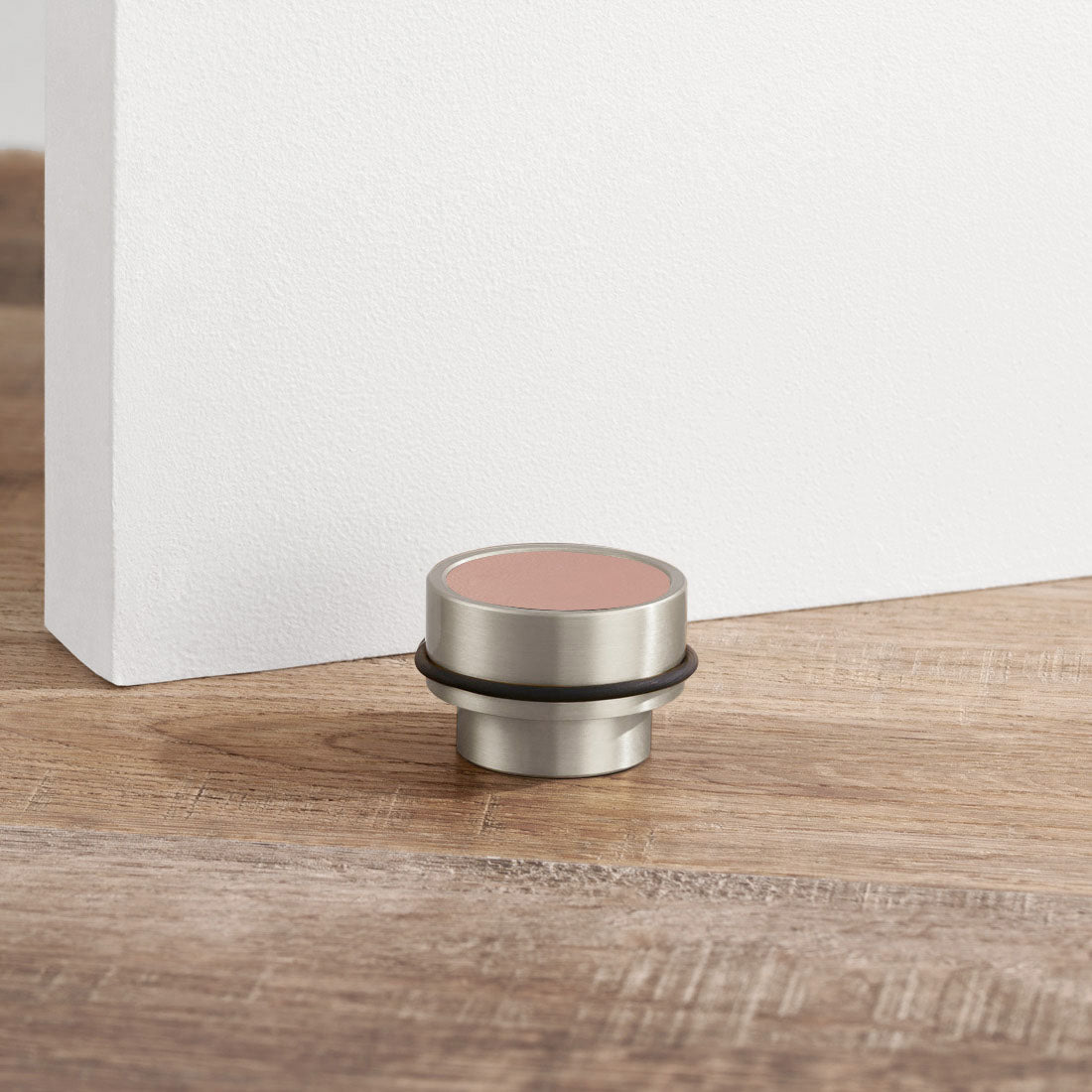 Brass & Pink Leather Mounted Door Stops in Silver