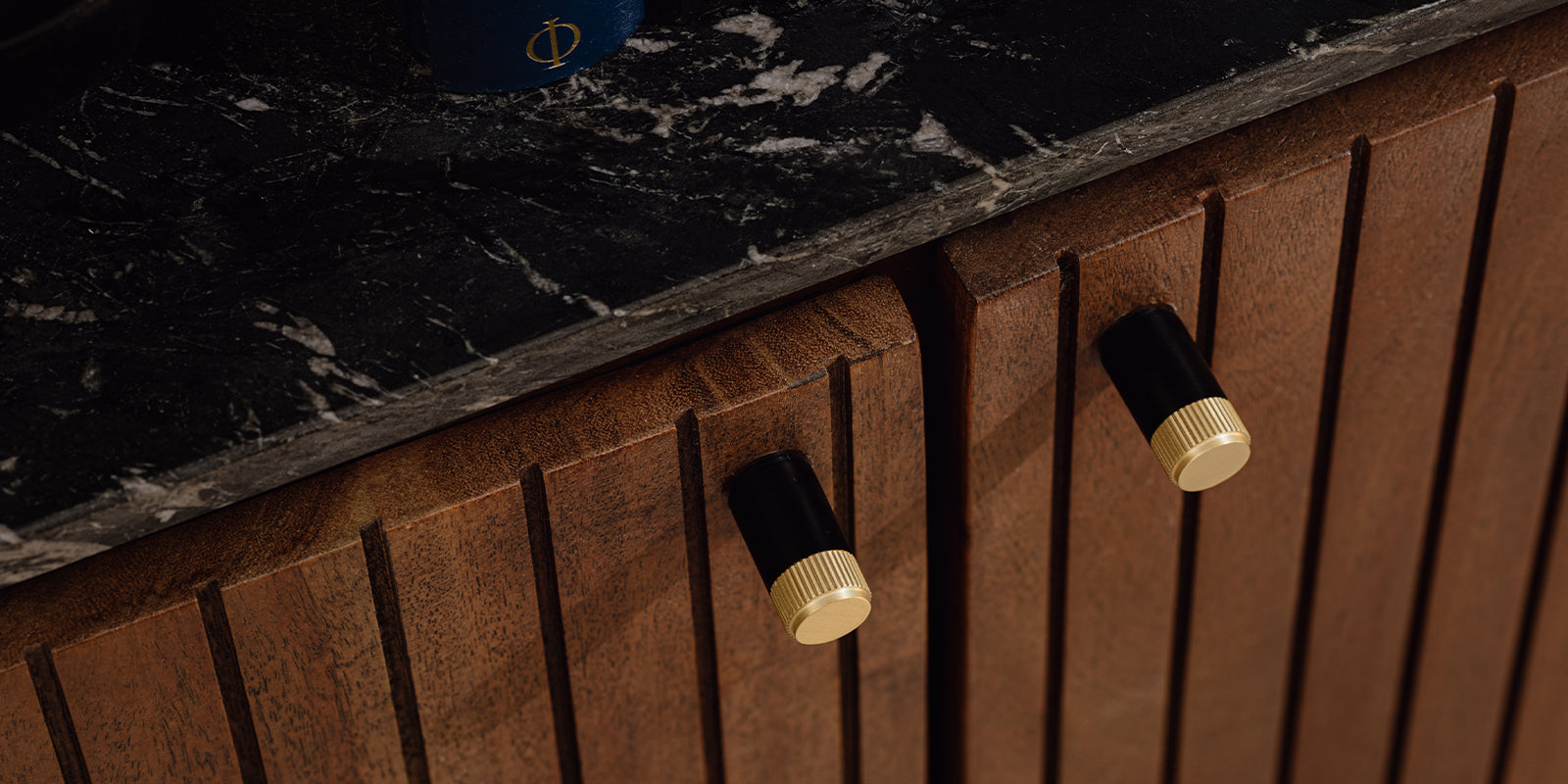 cabinet handles on wooden cupboard