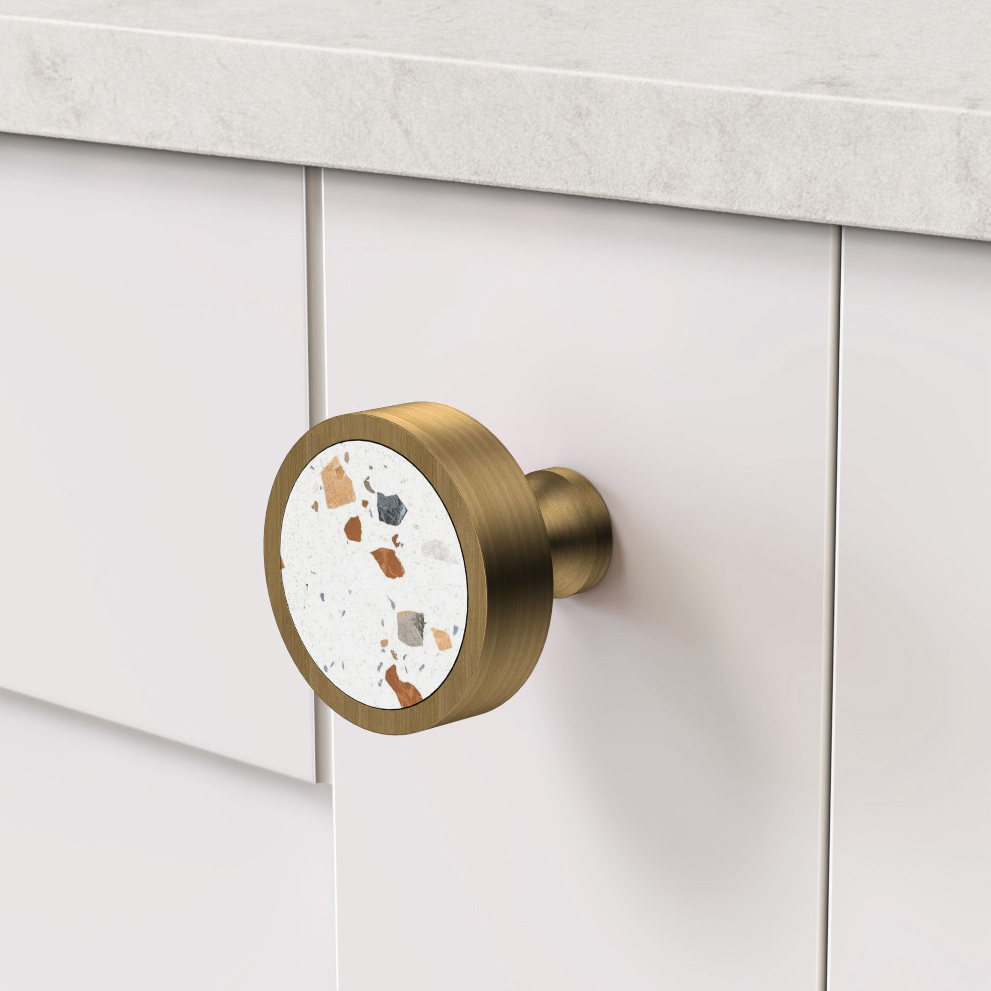 Brass & White Flek Terrazzo Round Door Knobs in Antique