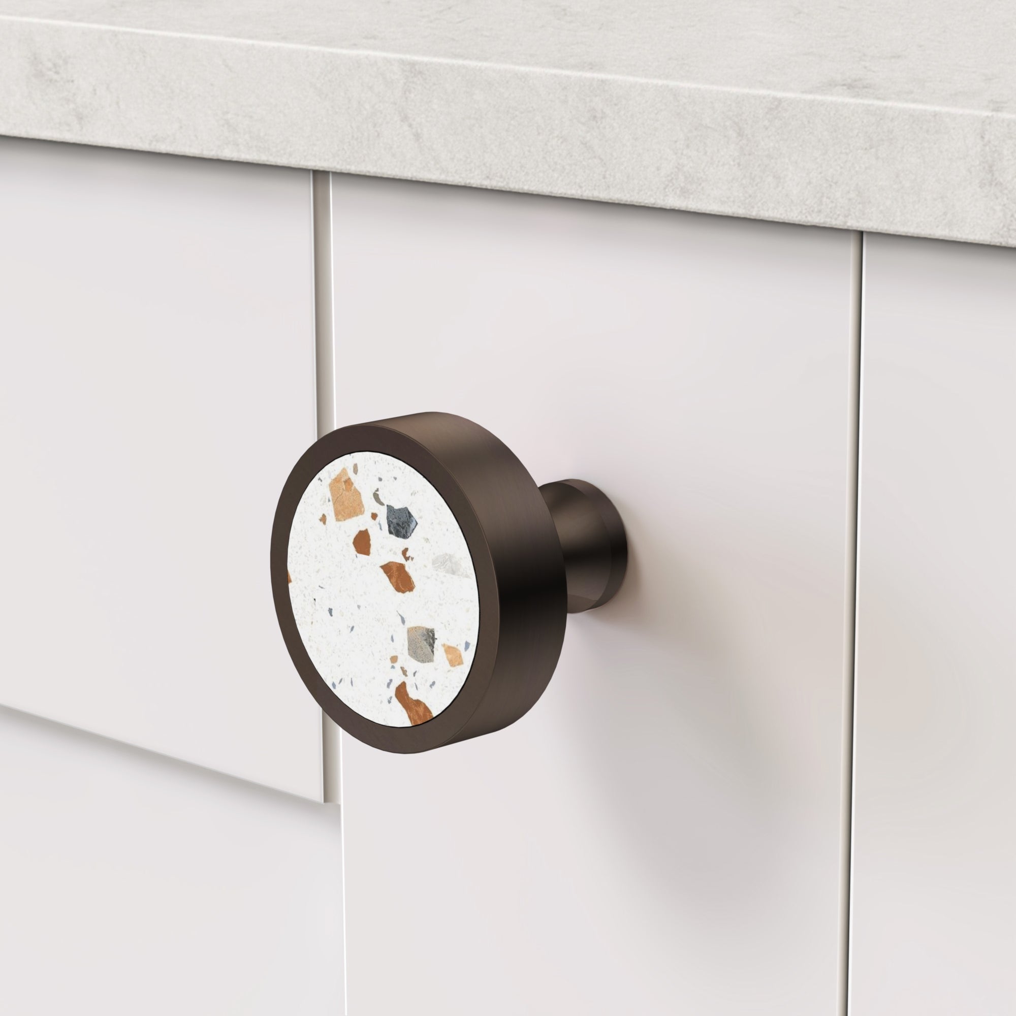 Brass & White Flek Terrazzo Round Door Knobs in Bronze