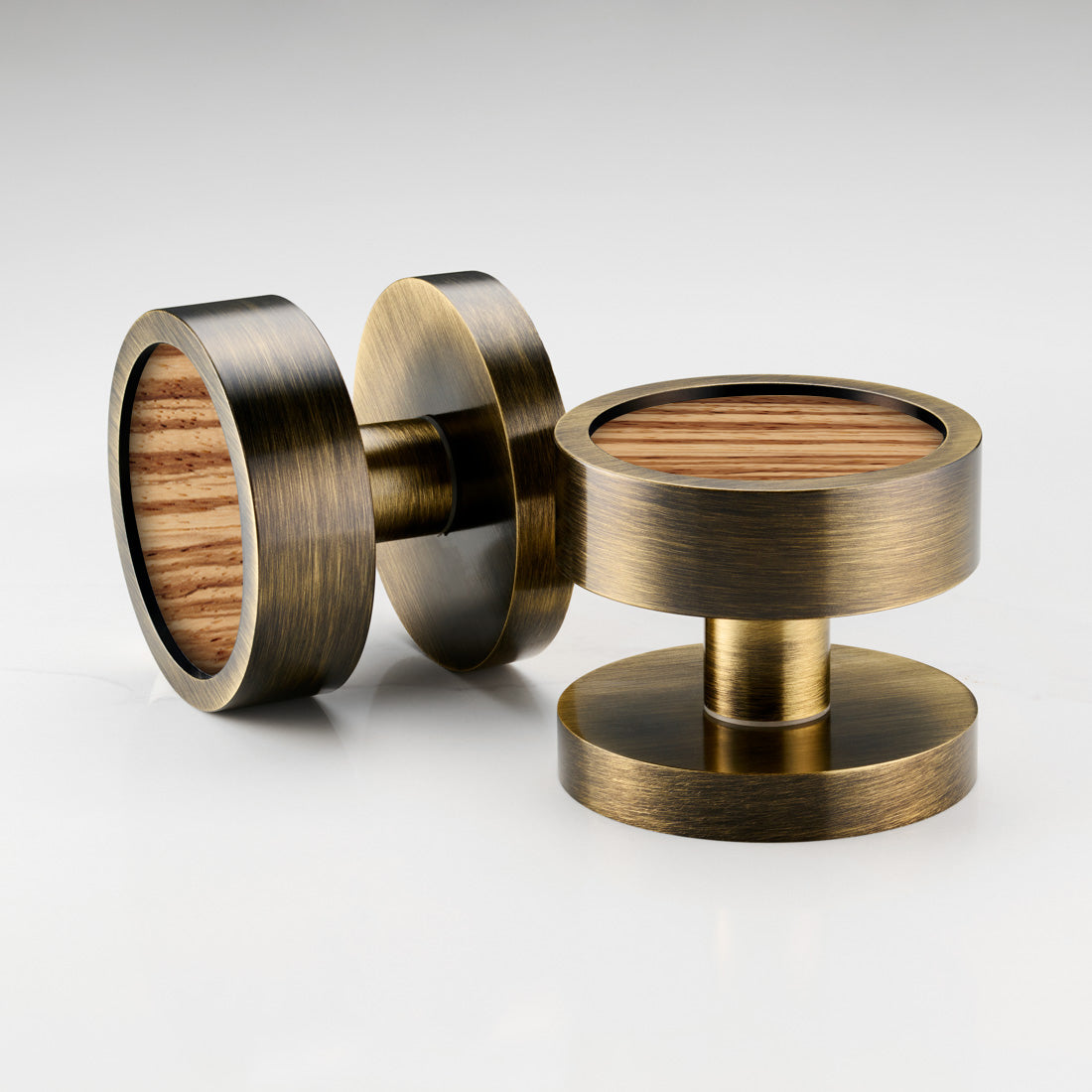 Brass and walnut mortice door knobs
