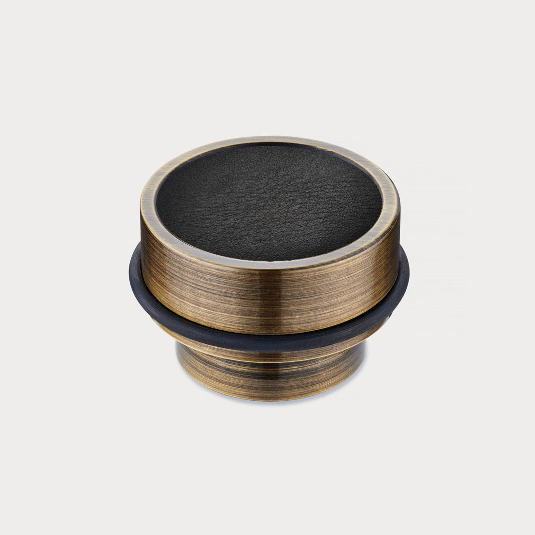 Brass & Black Leather Mounted Door Stops in Antique