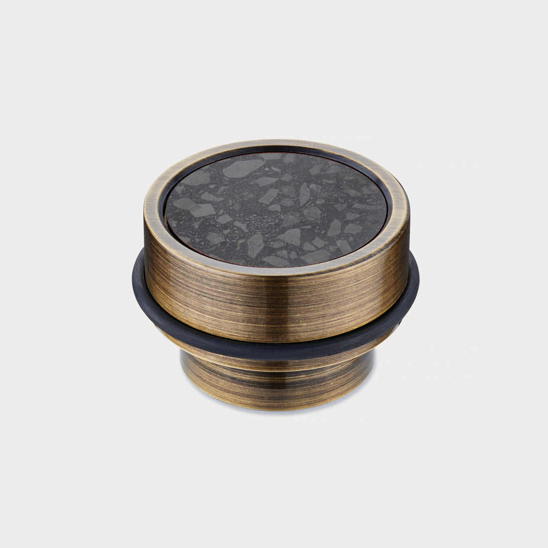 Brass & Black Terrazzo Floor Mounted Door Stops in Antique