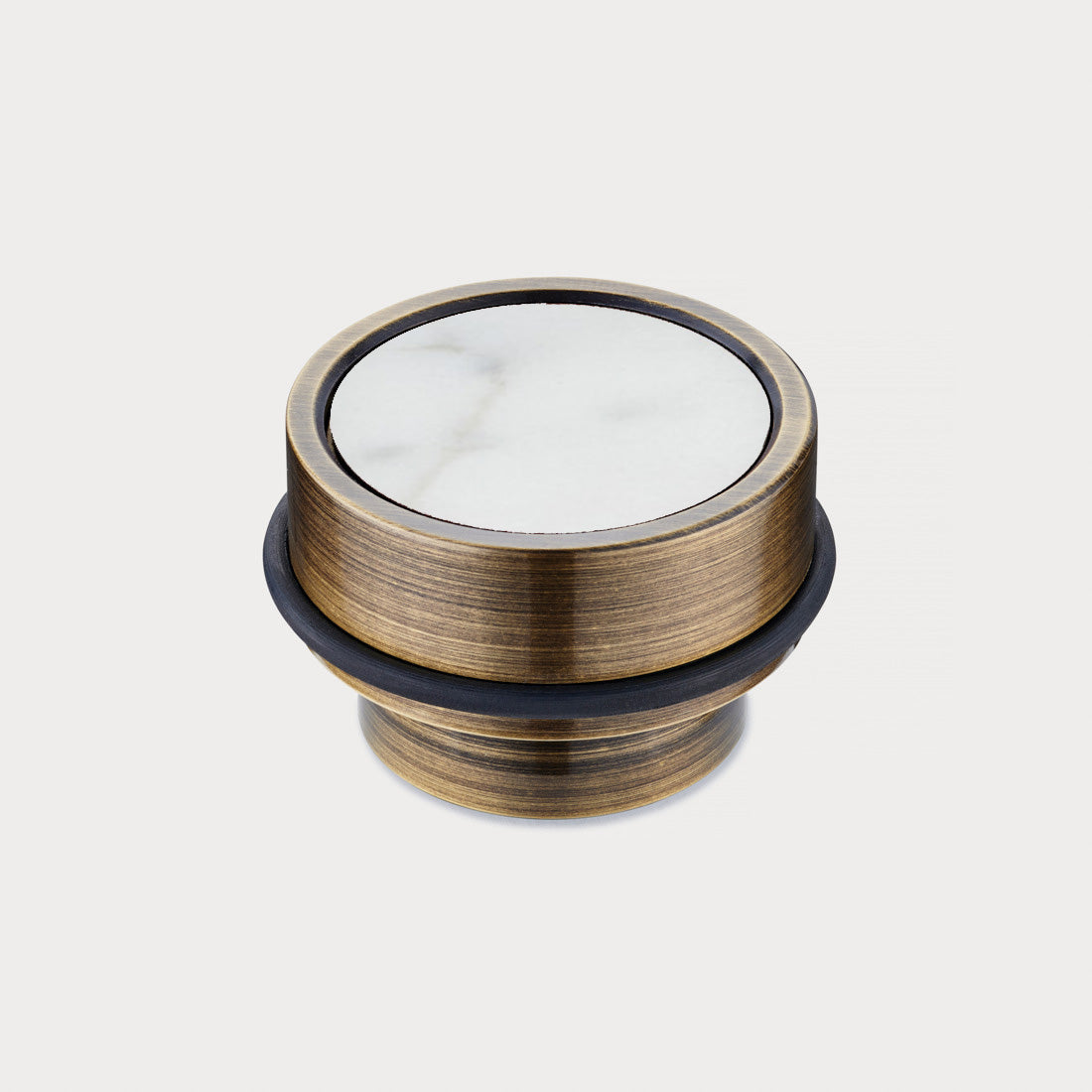 Brass & White Terrazzo Floor Mounted Door Stops in Antique