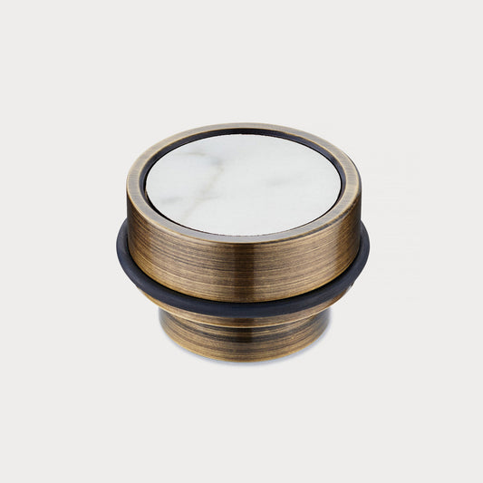 Brass & White Terrazzo Floor Mounted Door Stops in Antique