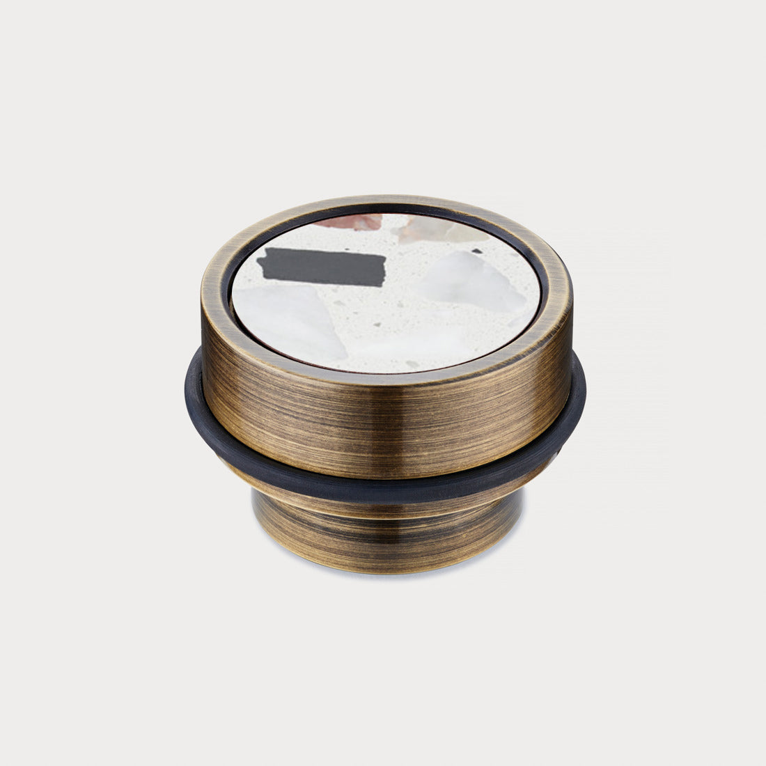 Brass & White Fleck Terrazzo Floor Mounted Door Stops in Antique