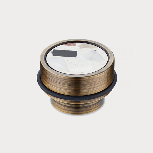 Brass & White Fleck Terrazzo Floor Mounted Door Stops in Antique
