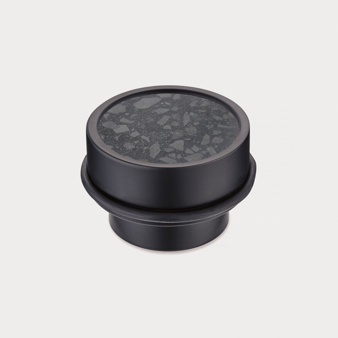 Brass & Black Terrazzo Floor Mounted Door Stops in Black