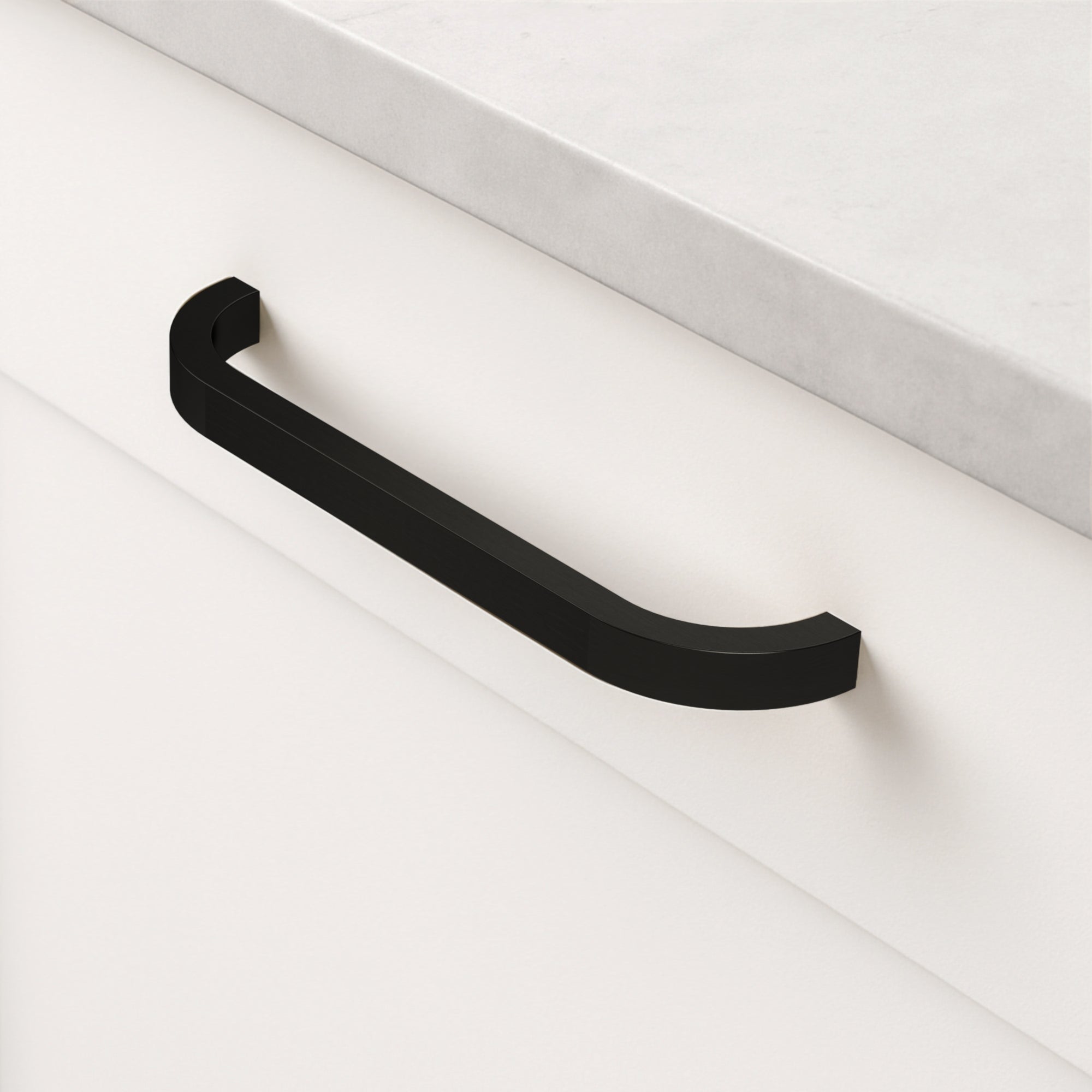 Brass Curved Cabinet Handles in Black