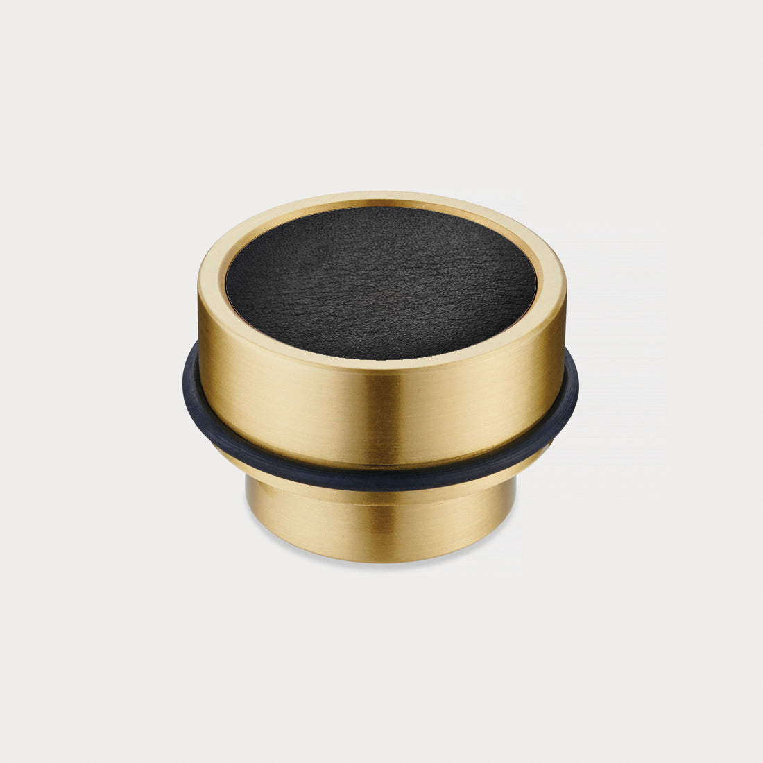 Brass & Black Leather Mounted Door Stops in Gold