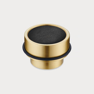 Brass & Black Leather Mounted Door Stops in Gold