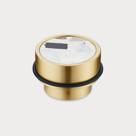 Brass & White Fleck Terrazzo Floor Mounted Door Stops in Gold