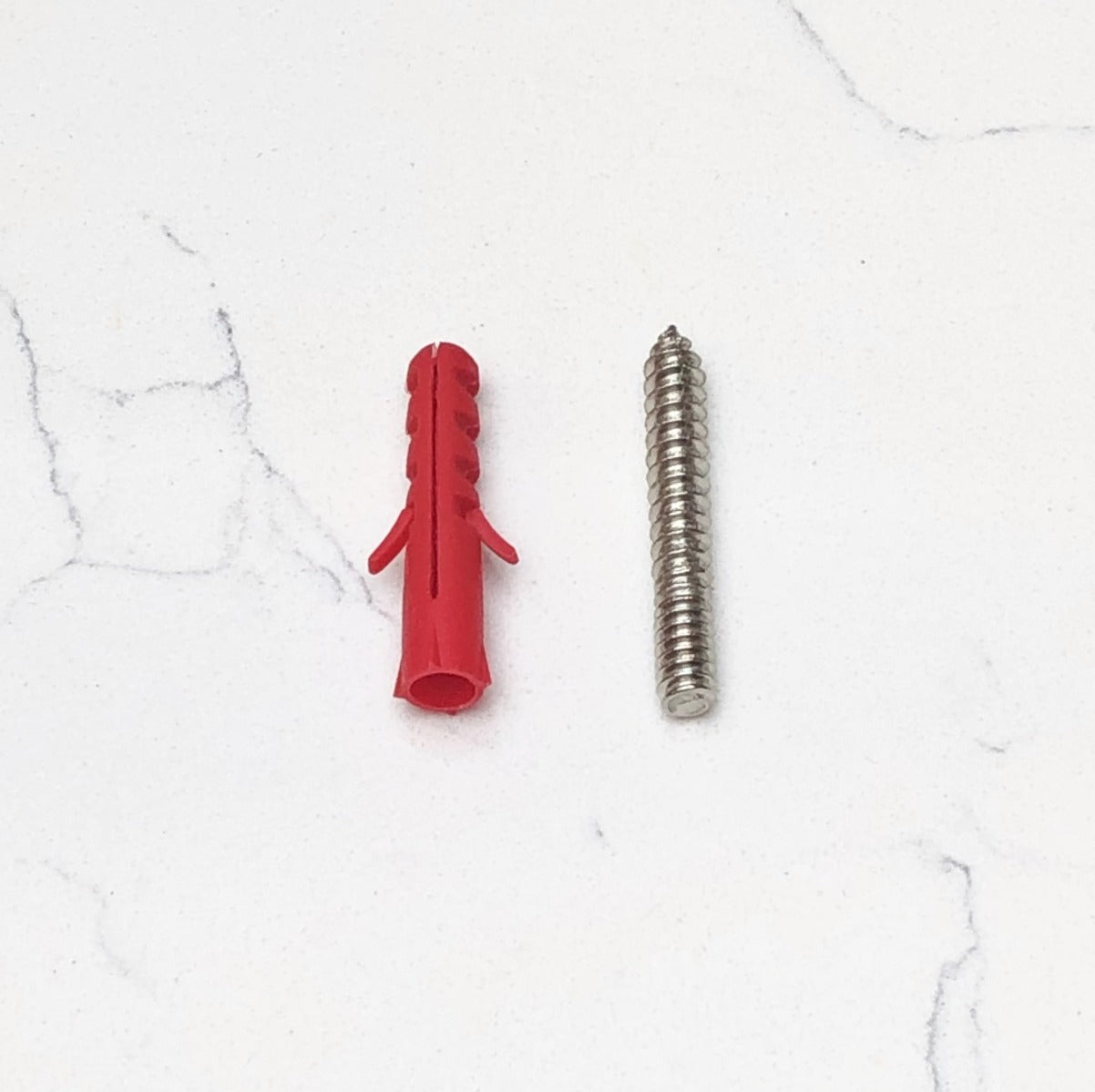 Brass & Black Terrazzo Floor Mounted Door Stops in Antique