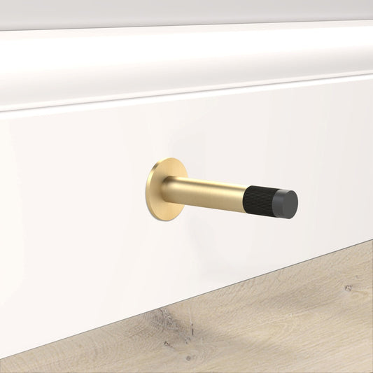 Brass Linear Wall Mounted Door Stop in Gold and Black