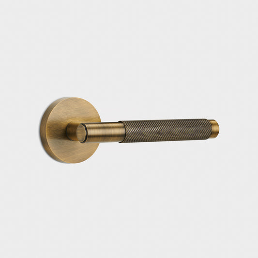 Brass Knurled Lever Door Handle in Antique