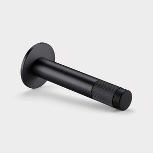 Brass Linear Wall Mounted Door Stop in Black